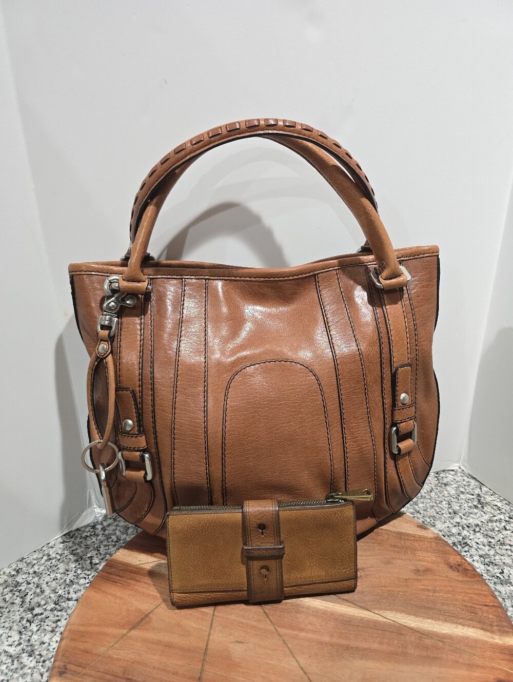 Fifty four Fossil large brown leather & wallet